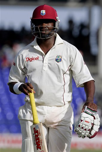 West Indies captain Brian Lara walks off the field after being dismissed for 19 runs off the bowling of India's Anil Kumble for 81 for 3 in the second innings on the fourth day of the third cricket Test match at Warner Park in Basseterre, St Kitts, Sunday, June 25, 2006. (AP Photo/Lynne Sladky) Ind-WI 3rd Test Day 4