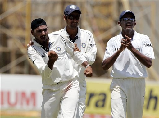 India's spin bowler Harbhajan Singh, left, celebrates after taking the final West Indies wicket with Mohammad Kaif, center, and S Sreesanth, right, on the second day of the fourth cricket Test at Kingston. Ind-WI 4th Test Day 2