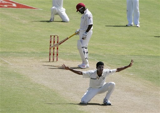 India's bowler S Sreesanth, front, makes an unsuccessfull appeal for LBW on west Indies batsman Brian Lara, rear, on the second day of the fourth cricket Test at Kingston. Ind-WI 4th Test Day 2