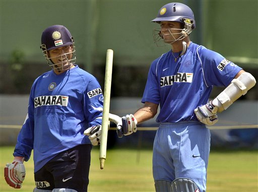 Indian captain Rahul Dravid, right, spins a wooden wicket as teammate Sachin Tendulkar looks on as the Indian cricket team prepares for the tri-nation series in Malaysia. India gears up for DLF Cup