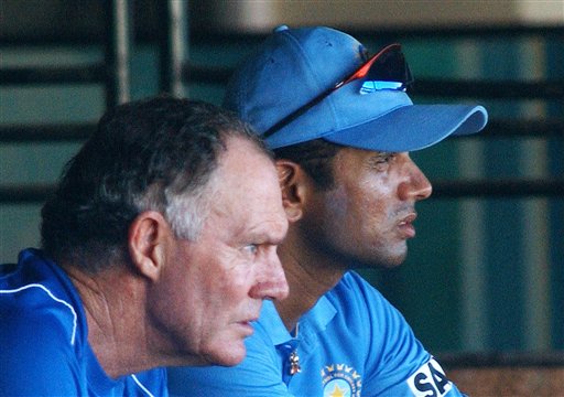 Indian Coach Greg Chappell, left, and Captain Rahul Dravid watch a practice match as the Indian cricket team prepares for the tri-nation series in Malaysia. India gears up for DLF Cup