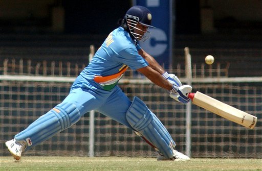 Mahendra Singh Dhoni bats during a practice match as the Indian cricket team prepares for the tri-nation series in Malaysia. India gears up for DLF Cup