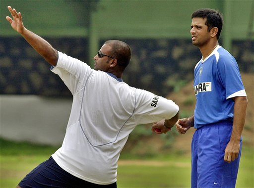 Rahul Dravid, right, looks on as teammate Ramesh Powar throws a ball during a training camp as the Indian team prepares for the tri-nation series in Malaysia. India gears up for DLF Cup