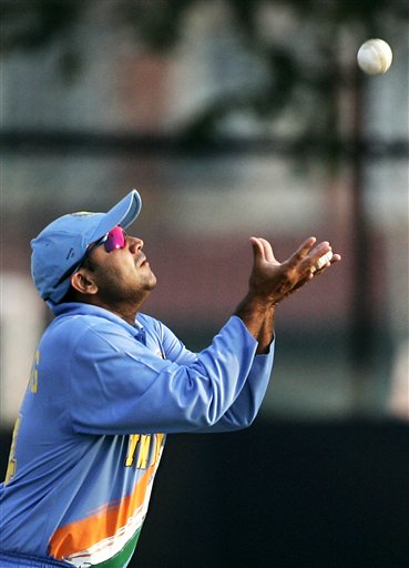 India's Verinder Sehwag prepares to catch out India's Shivnarine Chanderpaul for 21 runs their tri-series cricket match in Kuala Lumpur on Wednesday. DLF Cup Rd 2 Ind-WI