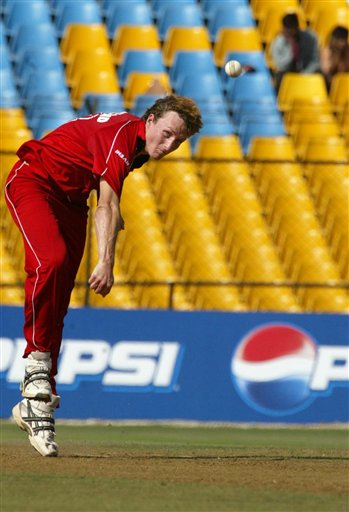 Anthony Ireland of Zimbabwe delivers a ball to Sanath Jayasuriya, unseen, of Sri Lanka, during the ICC Champions Trophy's qualifying match in Ahmedabad on Tuesday. ICC CT Sri Lanka-Zimbabwe