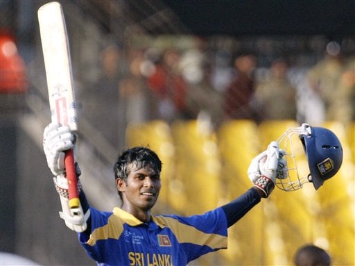 Sri Lankan cricketer Upul Tharanga acknowledges the crowd after scoring a century against Zimbabwe during the ICC Champions Trophy's qualifying match in Ahmedabad on Tuesday. ICC CT Sri Lanka-Zimbabwe