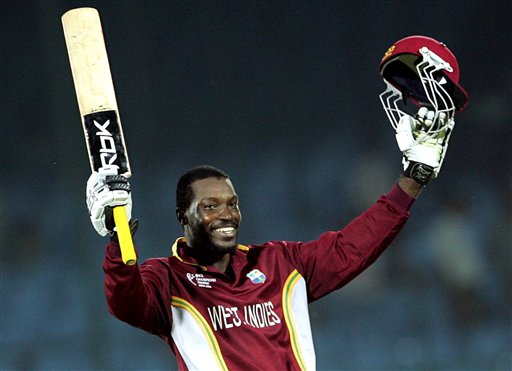 West Indies cricketer Chris Gayle celebrates his century, during the one-day international cricket match against Bangladesh for the ICC Champions Trophy in Jaipur on Wednesday. ICC CT WI-Bangladesh