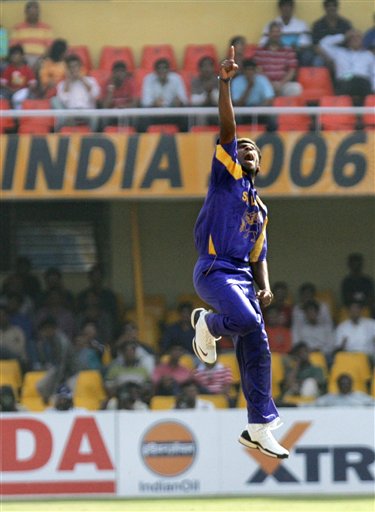 Sri Lanaka's Lasith Malinga exults after claiming the wicket of South Africa's Herschelle Gibbs, unseen, in their ICC Champions Trophy cricket tournament match in Ahmadabad on Tuesday. ICC SA-SL