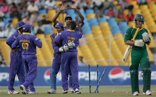 Sri Lankan players celebrate as Mark Boucher of South Africa departs after being bowled by Sri Lankan bowler Lasith Malinga in Ahmadabad on Tuesday. ICC SA-SL