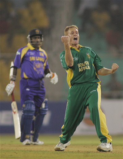 South African bowler Shaun Pollock celebrates after Sri Lankan batsman Sanath Jayasurya, left, was adjudged LBW off his bowling in Ahmadabad on Tuesday. ICC SA-SL
