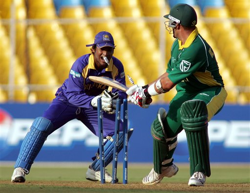 Sri Lankan wicketkeeper Kumar Sangakkara, left, stumps South Africa's Jacques Kallis off the bowling of Sanath Jayasuriya in Ahmadabad on Tuesday. ICC SA-SL