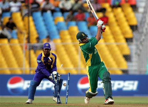South African batsman Justin Kemp is bowled by Sri Lankan bowler Sanath Jayasurya in Ahmadabad on Tuesday. ICC SA-SL