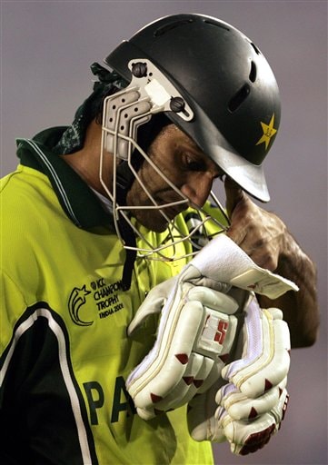 Pakistans's Muhammad Hafeez reacts after New Zealand's Jacob Oram took his wicket during the one day international cricket match for the ICC Champions Trophy in Mohali ICC CT NZ-Pak