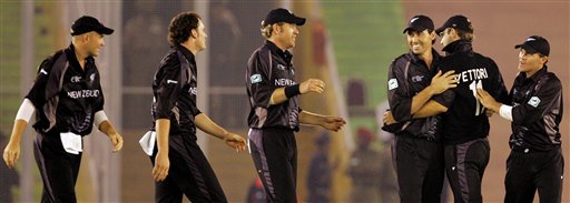 New Zealand cricket players celebrate their team's victory over Pakistan during the one day international cricket match for the ICC Champions Trophy in Mohali ICC CT NZ-Pak