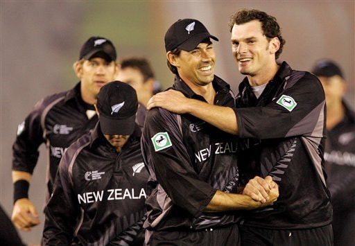 New Zealand's Stephen Fleming, second right, and Kyle Mills, far right, celebrate their victory over Pakistan during the one day international cricket match for the ICC Champions Trophy in Mohali ICC CT NZ-Pak