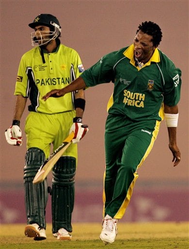 South Africa's Makhaya Ntini, right, celebrates a dismissal of Pakistan's Shoaib Malik, left, during their one-day international cricket match for the ICC Champions Trophy in Mohali on Friday. ICC CT Pak-SA