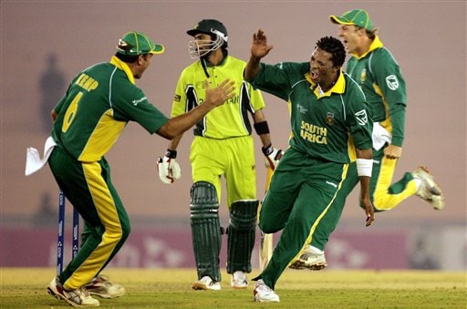 South Africa's Makhaya Ntini, second right celebrates the dismissal of Pakistan's Shoaib Malik, second left, during the one-day international cricket match for the ICC Champions Trophy in Mohali on Friday. ICC CT Pak-SA