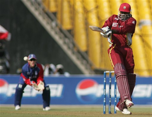 West Indies batsman Chris Gayle hits a four off England bowler James Anderson during their ICC Champions Trophy cricket tournament match in Ahmedabad on Saturday. ICC CT WI-Eng