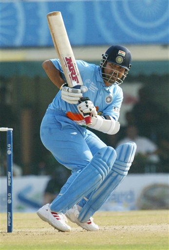 ndia's Sachin Tendulkar looks at the ball as he plays a shot off Australia's Glenn McGrath, unseen, during the one day international cricket match for the ICC Champions Trophy in Mohali on Sunday. ICC CT Ind-Aus