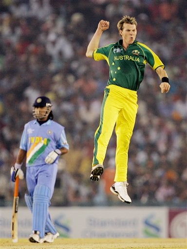 Australia's Brett Lee, right, leaps in the air to celebrate the dismissal of India's Mohammad Kaif, unseen, during the one day international cricket match for the ICC Champions Trophy in Mohali on Sunday. ICC CT Ind-Aus
