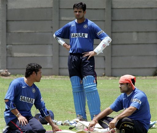 India's cricket captain Rahul Dravid, center, chats with teammates Sachin Tendulkar, left, and Virender Sehwag, right, during their practice in Benoni, South Africa. India gears up for SA
