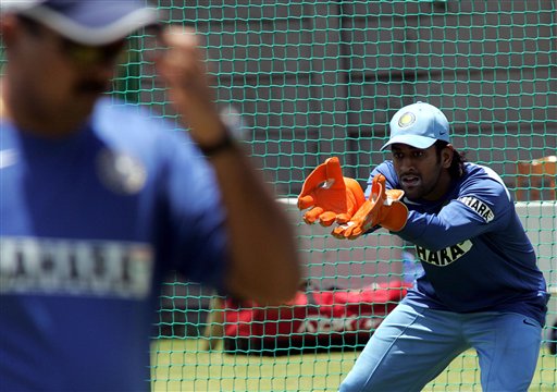 India's wicketkeeper Mahendra Dhoni, looks on during the fielding practice in Benoni, South Africa. India gears up for SA