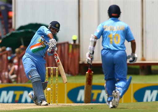 Indian batsman Dinesh Mongia (left) plays the ball while Indian batsman Sachin Tendulkar (right) watches on during the final ODI at Supersport Park, Centurion on Sunday. 5th ODI: Ind vs SA