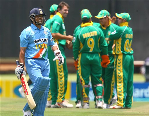 Indian batsman Sachin Tendulkar leaves the field while the South African team celebrates the taking of his wicket during the final ODI at Supersport Park, Centurion on Sunday. 5th ODI: Ind vs SA