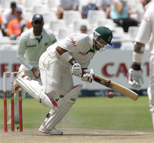 South Africa's batsman Ashwell Prince, right, in action as India's fielder VVS Laxman, left, looks on during the third day of the 3rd and final Test match against India at Newlands stadium in Cape Town, South Africa, Thursday. Ind-SA 3rd Test Day 3
