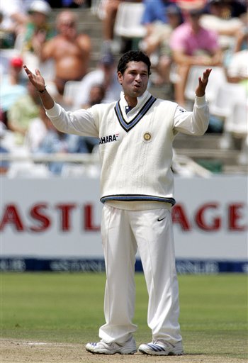 India's bowler Sachin Tendulkar, celebrates after dismissing South Africa's batsman Jacques Kallis, unseen, for 54 on the third day of the 3rd and final Test match against South Africa at Newlands stadium in Cape Town, South Africa, Thursday. Ind-SA 3rd Test Day 3