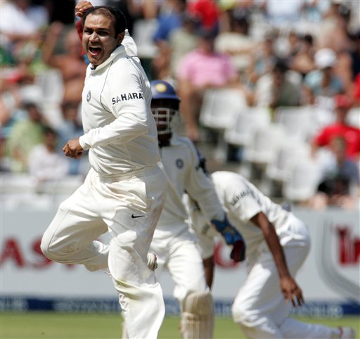 India's bowler Virender Sehwag, left, celebrates with teammates after dismissing South Africa's batsman Herschelle Gibbs, unseen, for 7 runs after a successfully appeal for a LBW on the third day of the 3rd and final Test match against South Africa at Newlands stadium in Cape Town, South Africa, Thursday. Ind-SA 3rd Test Day 3