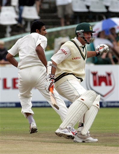 South Africa's batsman Graeme Smith, right, runs back after attempting a run as India's bowler Anil Kumble, left, calls for the ball on the final day of the 3rd and final Test match at Newlands stadium in Cape Town Ind-SA 3rd Test Day 5