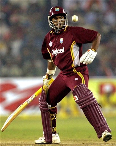 West Indies cricketer Shiv Narain Chanderpaul follows the ball after playing a shot against India during the second one-day international cricket match in Cuttack. Ind-WI 2nd ODI