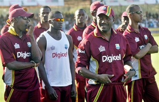 West Indies cricket players attend a presentation ceremony after the fourth one-day international cricket match against India in Vadodara, India. Ind-WI 4th ODI