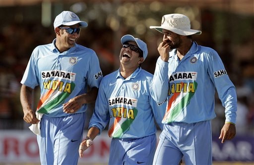 Indian cricketers Sachin Tendulkar, center, Anil Kumble, left and Harbhajan Singh celebrate their team's victory over West Indies during the fourth one-day international cricket match in Vadodara, India. Ind-WI 4th ODI