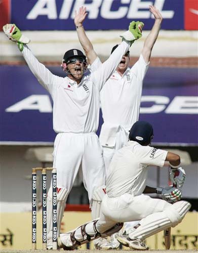 England's wicketkeeper Matt Prior and Paul Collingwood make a successful leg before wicket appeal against Gautam Gambhir during the second day of the first Test match between India and England in Chennai on Friday.(AP Photo) India vs England: 1st Test, Day 2
