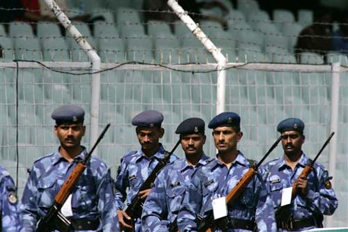Indian paramilitary soldiers patrol inside the Chidambaram Stadium during the second day of the first Test between India and England in Chennai on Friday. (AP Photo) India vs England: 1st Test, Day 2