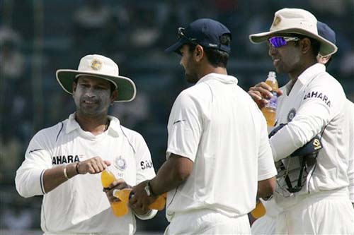 India's Sachin Tendulkar, VVS Laxman and Murali Vijay take a break during the second day of the first Test between India and England in Chennai on Friday.(AP Photo) India vs England: 1st Test, Day 2
