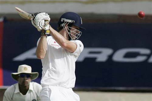 England's James Anderson hits a shot as India's VVS Laxman takes his position during second day of the first Test match between India and England in Chennai on Friday.(AP Photo) India vs England: 1st Test, Day 2