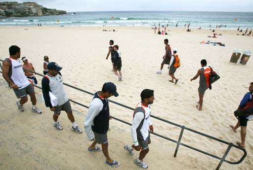 Indian cricket team members walk onto Sydney's Bondi Beach. Team India breathes relief