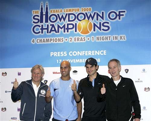 Swedish Bjorn Borg, American James Blake, Swiss Roger Federer, and American John McEnroe show thumbs up after a press conference in Kuala Lumpur, Malaysia on Monday. They visited Malaysia for the Showdown of Champions Kuala Lumpur 2008 exhibition matches on Tuesday. Showdown of champions