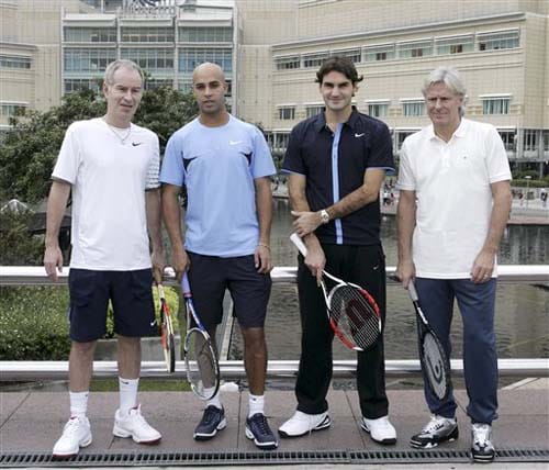 Tennis stars American John McEnroe, American James Blake, Swiss Roger Federer, and Swedish Bjorn Borg pose during a photo call in Kuala Lumpur, Malaysia on Monday. Showdown of champions