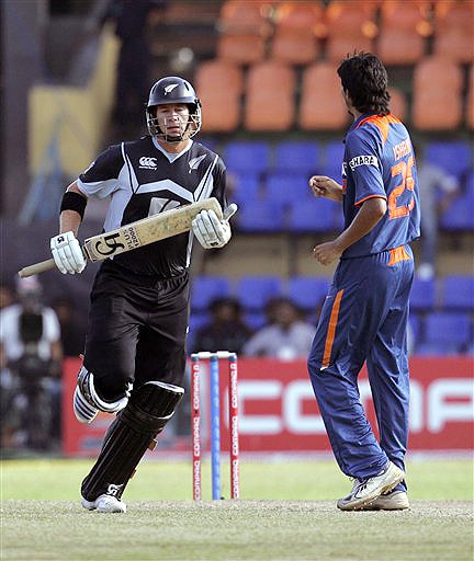 New Zealand's Jacob Oram runs between wickets, as India's Ishant Sharma looks on during their ODI match for the tri-nation series in Colombo on Friday. (AP Photo)New Zealand's Jacob Oram runs between wickets, as India's Ishant Sharma looks on during their ODI match for the tri-nation series in Colombo on Friday. (AP Photo) Tri-series: IND vs NZ