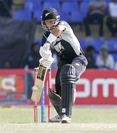 New Zealand's Grant Elliott plays a shot during the ODI match between India and New Zealand in Colombo on Friday. (AP Photo) Tri-series: IND vs NZ