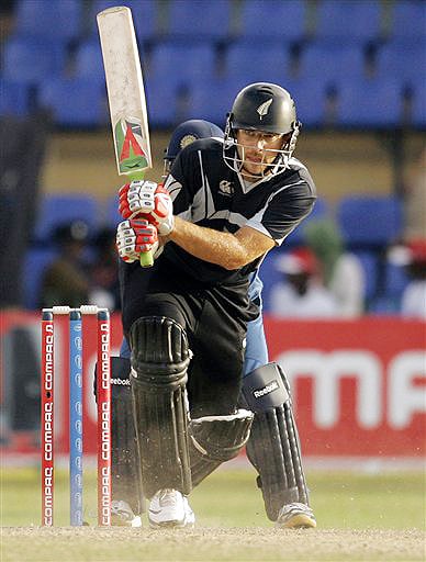 New Zealand captain Daniel Vettori bats during the ODI match between India and New Zealand for the tri nation series in Colombo on Friday. (AP Photo) Tri-series: IND vs NZ