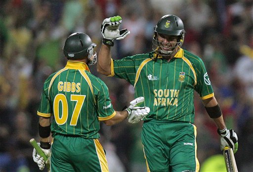 South Africa's batman Justin Kemp, right, celebrates with teammate Herschelle Gibbs, left, after winning their Twenty20 World Championship cricket match against West Indies at the Wanderers Stadium in Johannesburg, South Africa, Tuesday, Sept. 11, 2007. South Africa won by 8 wickets with 14 balls remaining. WI v SA