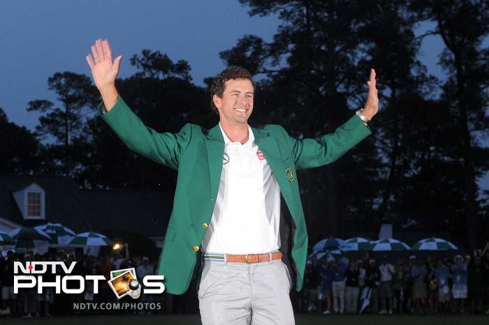 Australia's Adam Scott sank a 10-foot birdie putt on the second playoff hole to beat Angel Cabrera and win the 77th Masters, becoming the first Australian golfer to capture the green jacket. (AFP image)