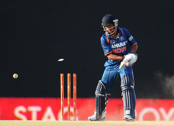 Ashok Dinda is dismissed by Farveez Maharoof during the sixth ODI of the Asia Cup between Sri Lanka and Indian at the Rangiri Dambulla International stadium in Dambulla. (AFP Photo) Asia Cup: Ind vs SL