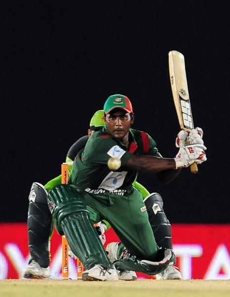 Junaid Siddique plays a shot during the fifth ODI of the Asia Cup between Pakistan and Bangladesh at the Rangiri Dambulla International Cricket stadium in Dambulla. (AFP Photo) Asia Cup: Pak vs B'desh