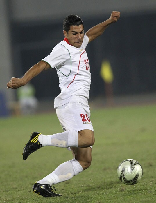 Seyediman Moosavi of Iran kicks the ball during the men's quarter-final match against IOman at the 16th Asian Games in Guangzhou on November 19, 2010. Iran beat Oman 1-0. (AFP Photo)